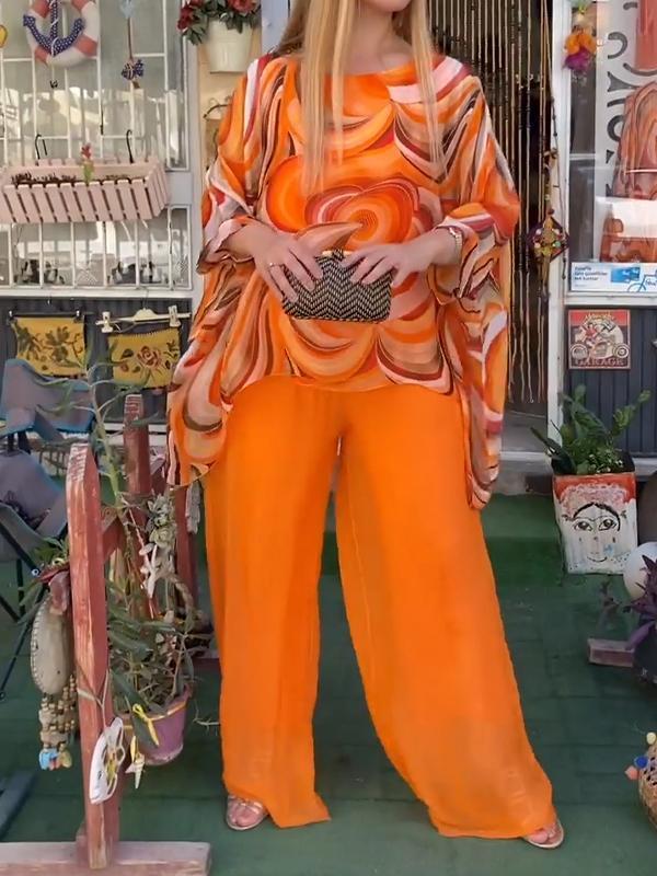 Novalie - Vibrant Orange Printed Suit